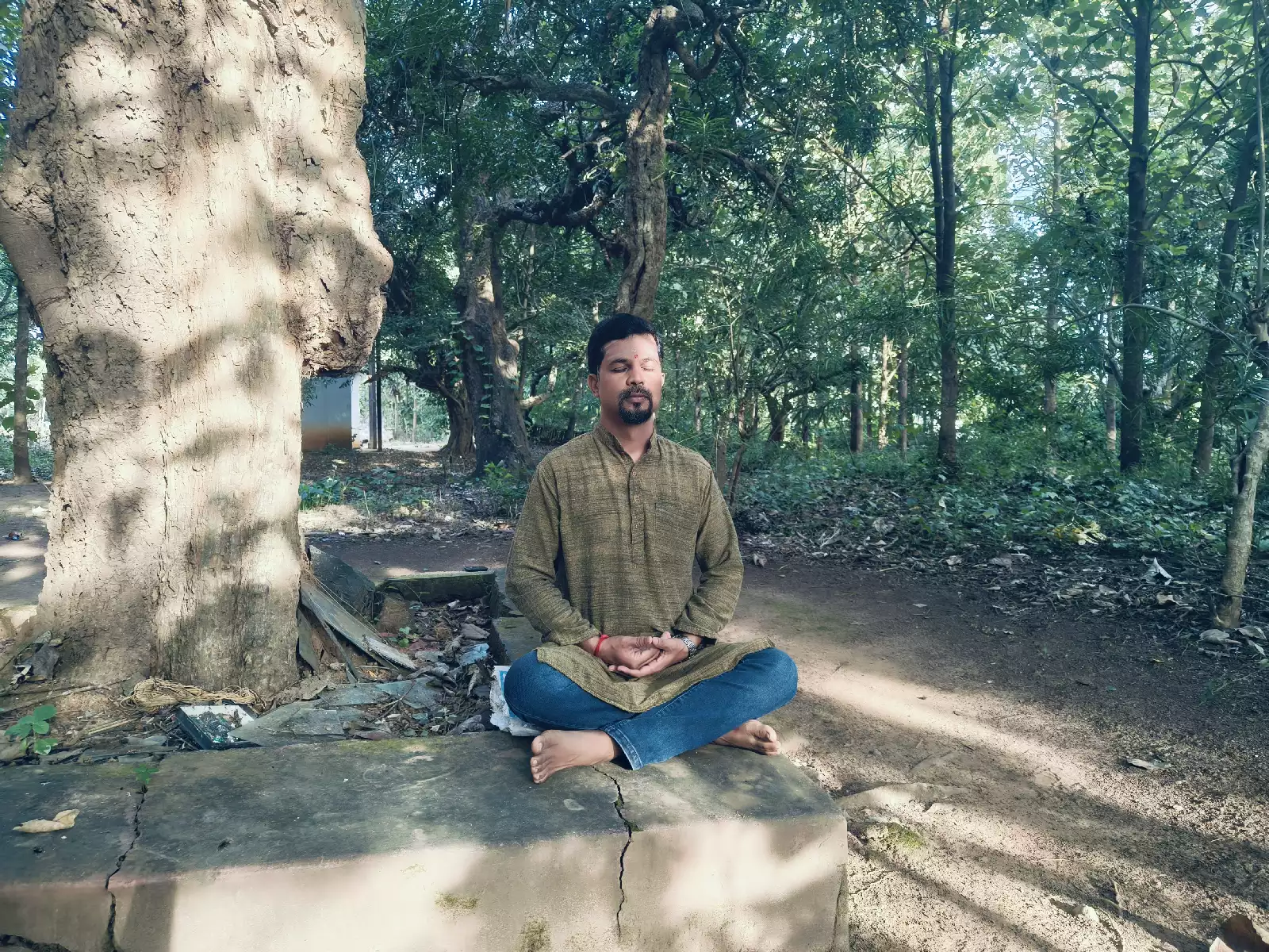Guruji — eyes closed, in practice