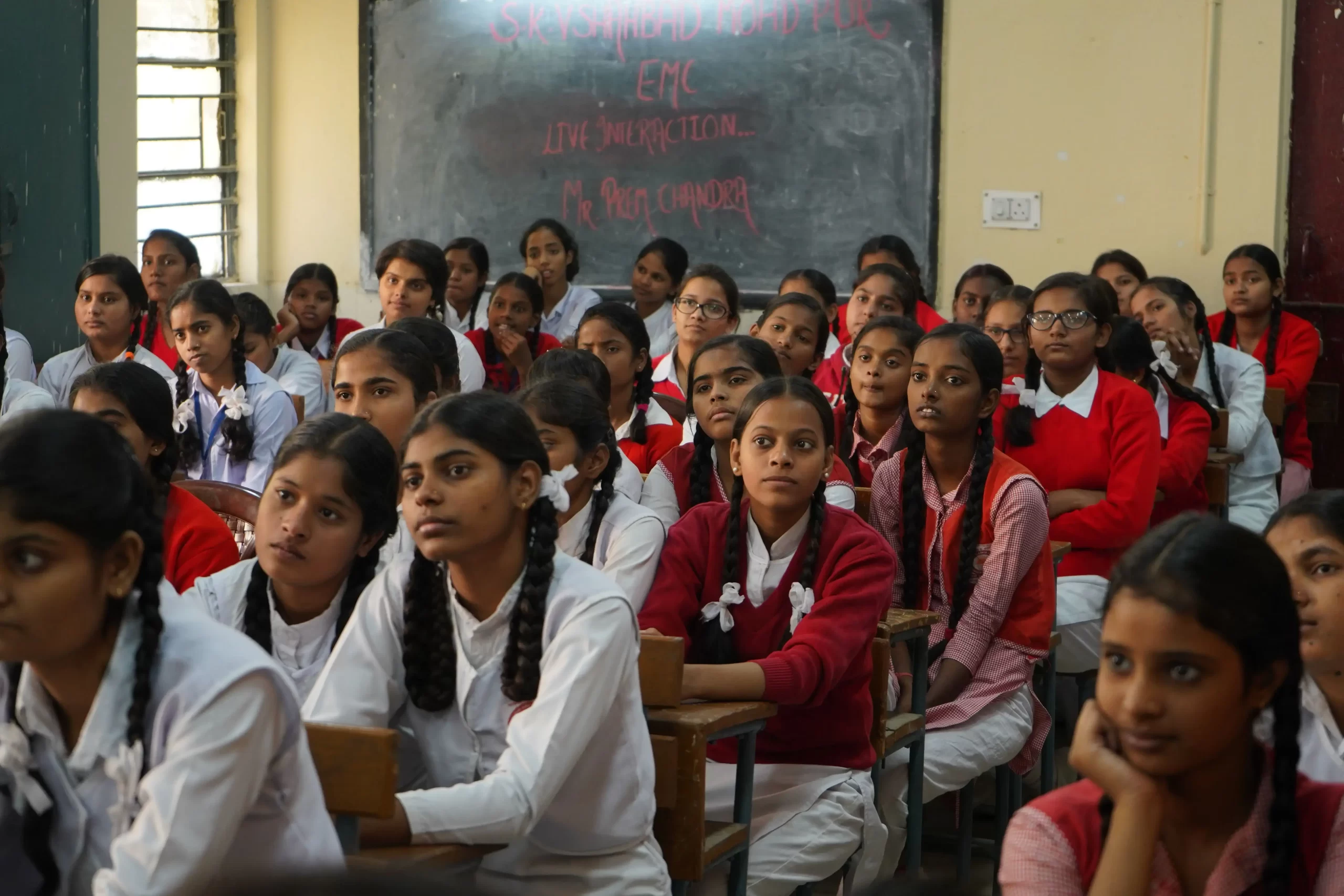 Guruji's rural school seva — the training carried back into village classrooms.
